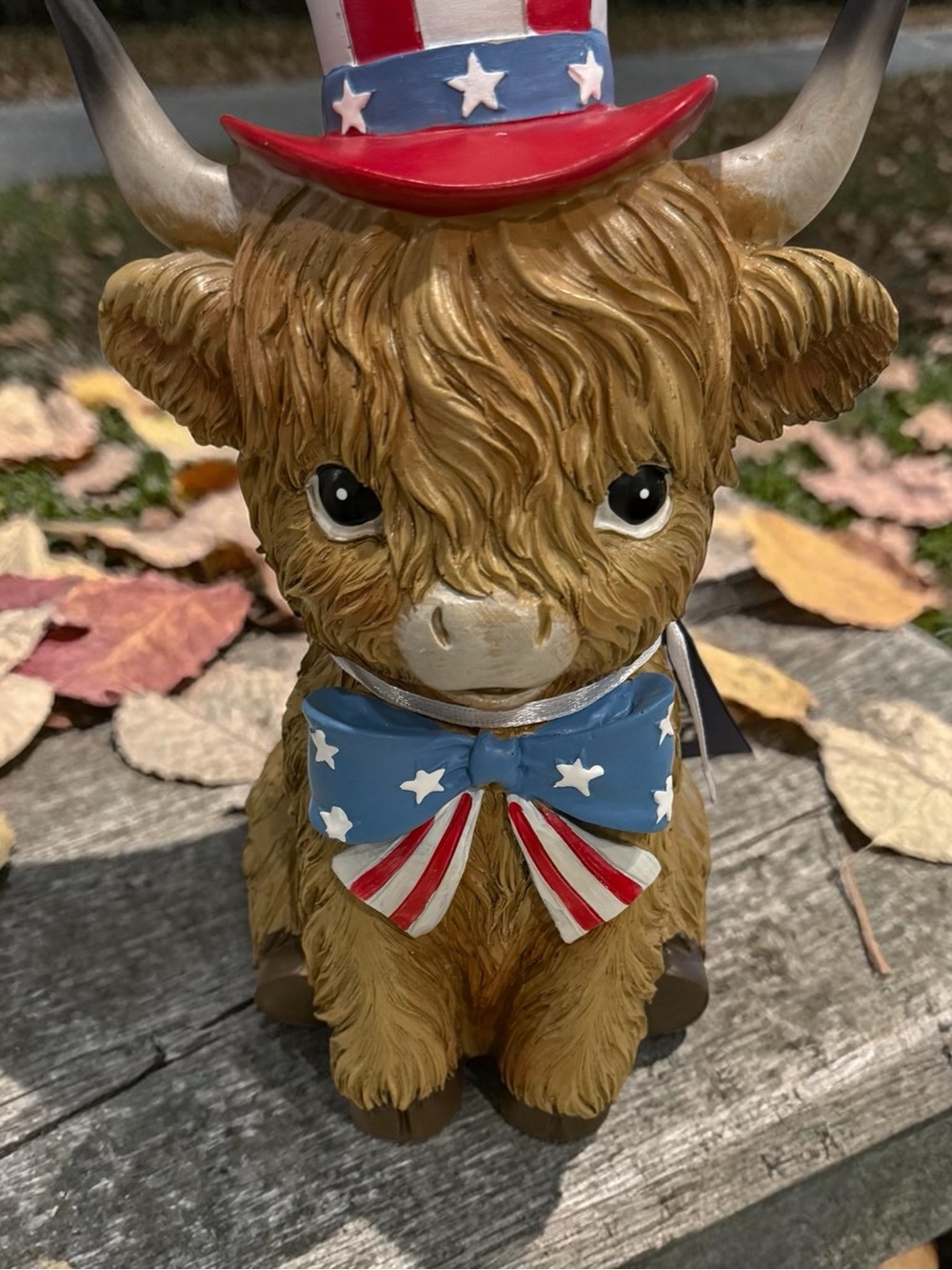 Patriotic Brown Highland Cow Figurine with Star-Spangled Bow